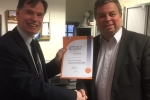Neil Bannister receiving his certificate